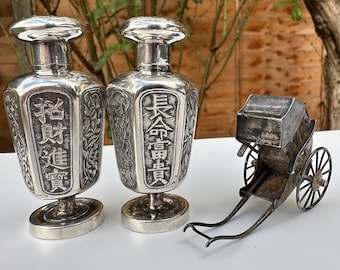 A Small Collection of Antique Chinese Silver Items including A Pair of Silver Salt and Pepper Shakers by Wang Hing and A Silver Rickshaw