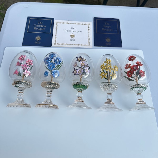A Set of 5 Franklin Mint House of Faberge Lead Crystal Eggs of the Enamel Carnation, Blue Flower, Violet, Daffodil and Poppy Bouquets
