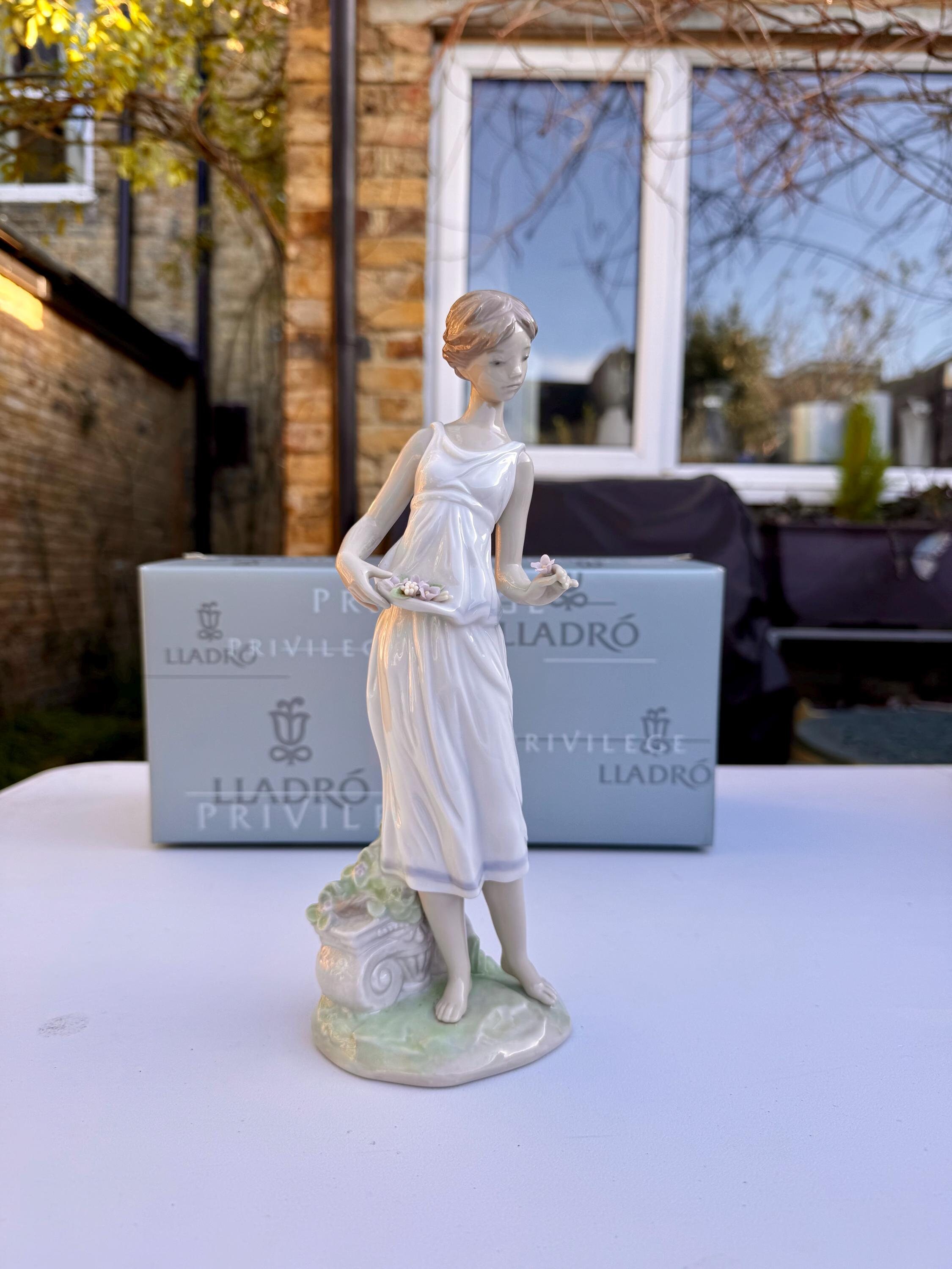 A Boxed Lladro Privilege 7709 Porcelain Figurine of Flowers for A