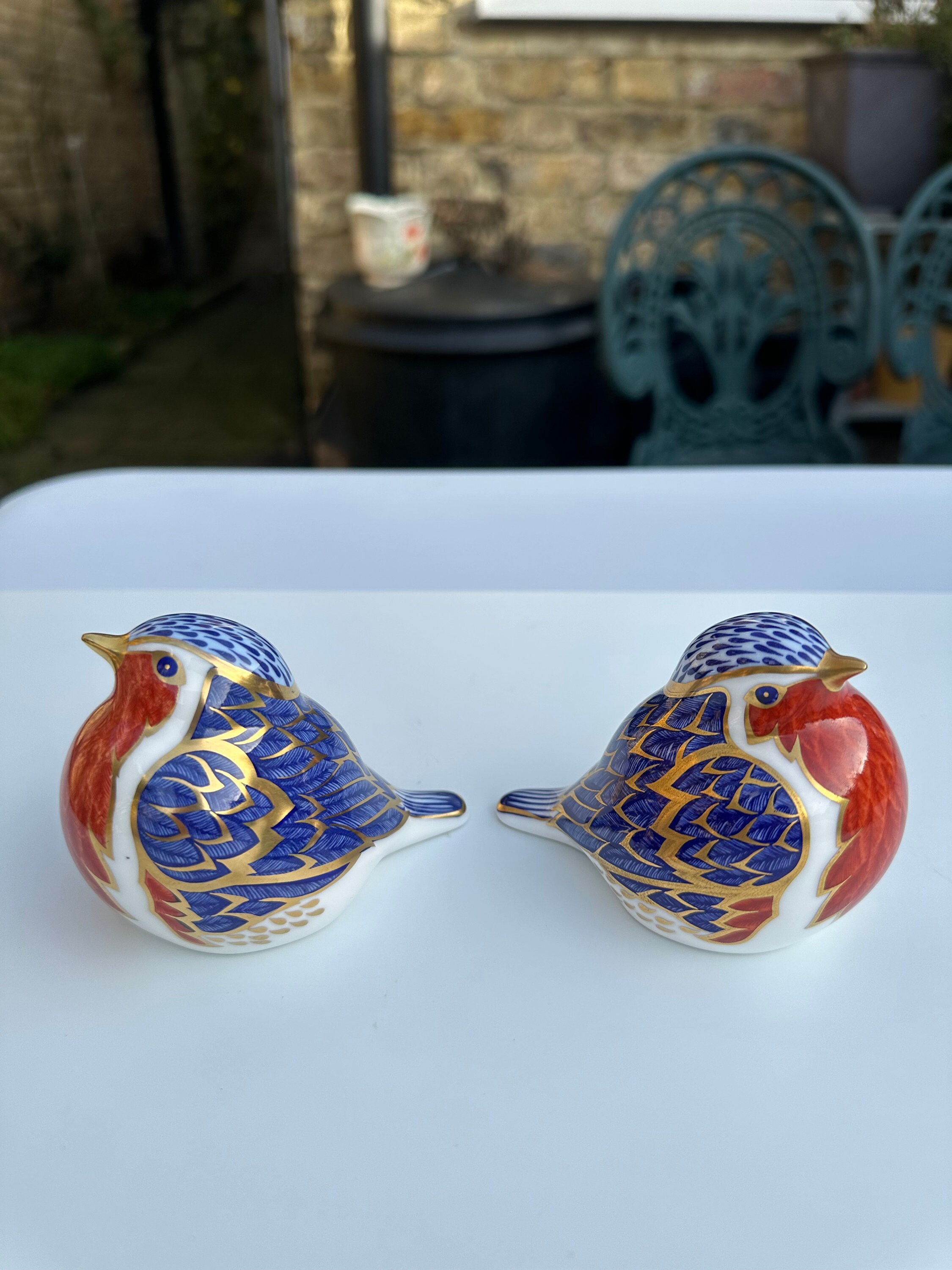 A Group of Royal Crown Derby Bird Paperweights of 2 Robins