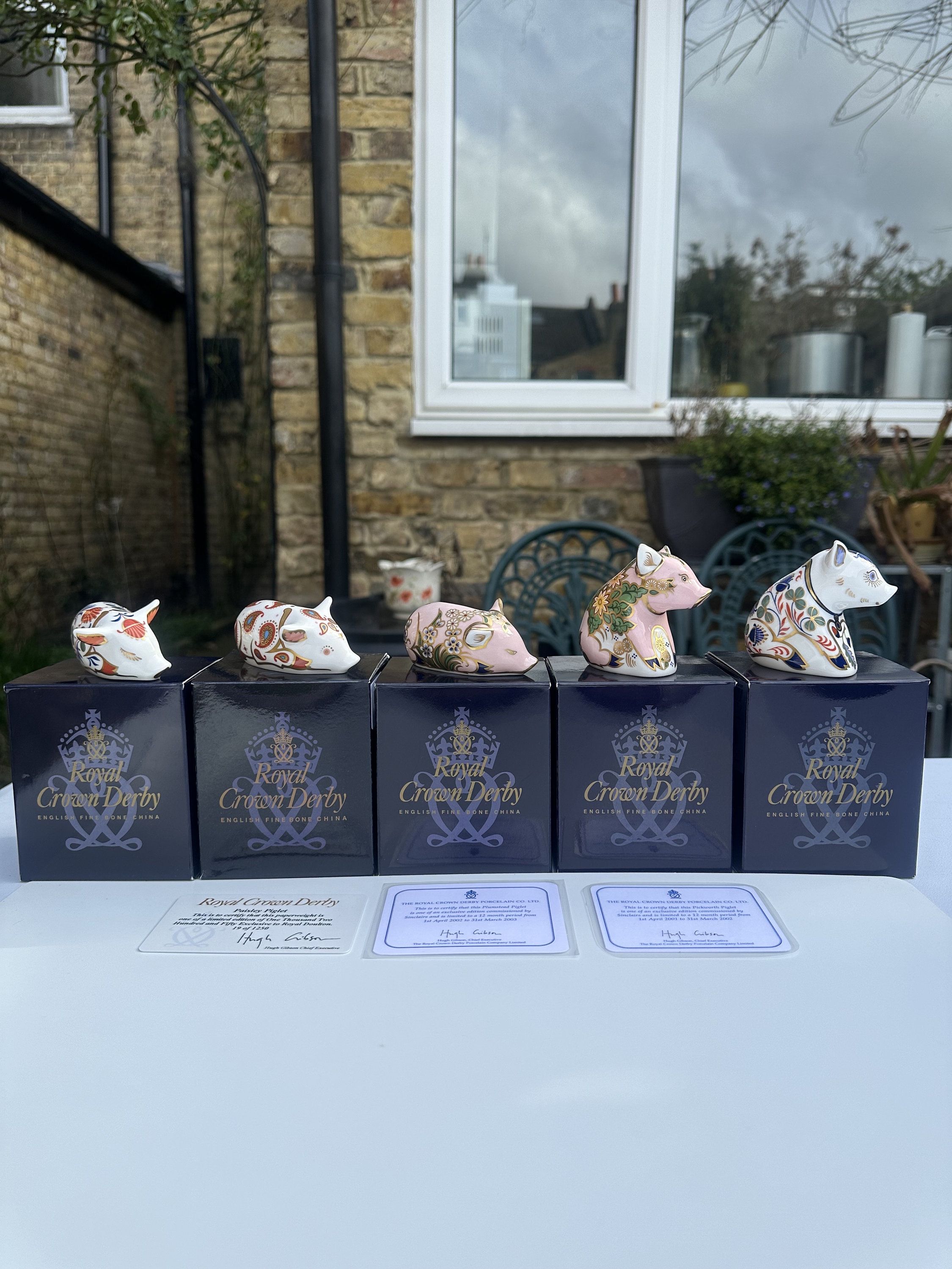 A Group of 5 Royal Crown Derby Piglet Paperweights of Sleeping Piglet, Paisley Piglet, Plumstead Piglet, Pickworth Piglet and Sitting Piglet