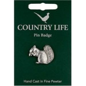 May include: A silver-coloured squirrel pin badge made of fine pewter, displayed on a dark green backing card. The card features the text "COUNTRY LIFE", "Pin Badge", and "Hand Cast in Fine Pewter" with a small white bird silhouette icon.