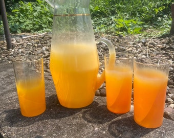 Mid century modern vintage blendo atomic orange glass pitcher and glasses