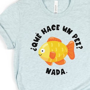 Qué hace un pez Nada Tee Spanish Teacher Shirt Bilingual Teacher Dual Language Instruction Teacher Tee image 1