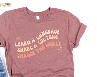 Learn a language share a culture change the world Spanish Teacher Shirt Bilingual Teacher Dual Language Instruction Teacher Tee