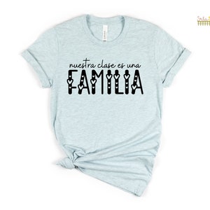 Nuestra Clase es una Familia Hearts Spanish Tee Back to School T Shirts for Spanish Teachers Dual Language Instruction Bilingual Tee Heather Ice Blue