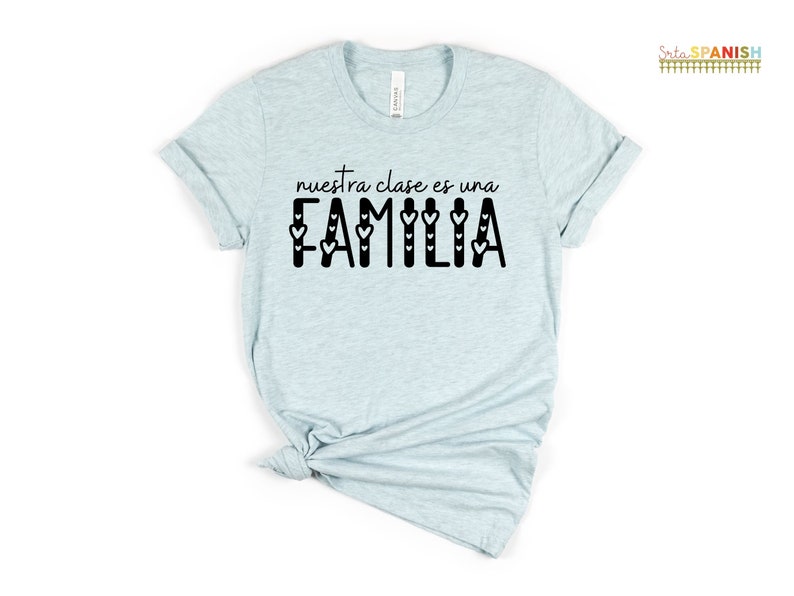 Nuestra Clase es una Familia Hearts Spanish Tee Back to School T Shirts for Spanish Teachers Dual Language Instruction Bilingual Tee Heather Ice Blue