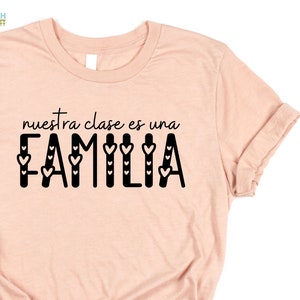 Nuestra Clase es una Familia Hearts Spanish Tee Back to School T Shirts for Spanish Teachers Dual Language Instruction Bilingual Tee Heather Peach