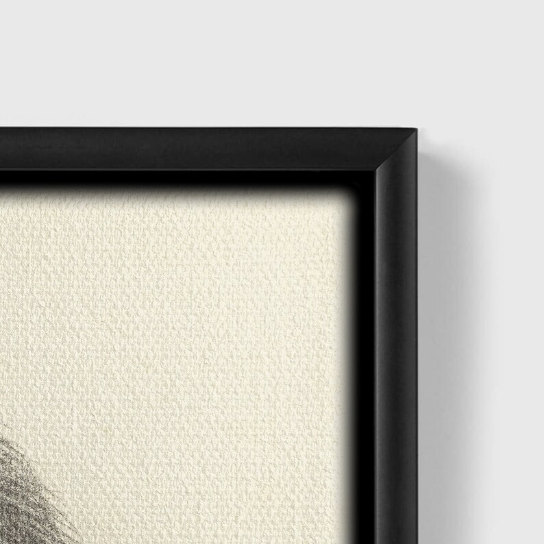 May include: A black framed canvas with a textured white surface. The canvas is blank, ready for a painting or artwork.