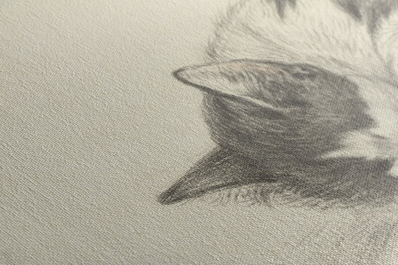 May include: A close-up of a gray and white textured fabric with a black and gray bird design. The bird's beak is pointed and its feathers are detailed.