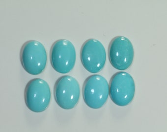 14 x 10mm Sleeping Beauty Turquoise cabochon (price per pair)