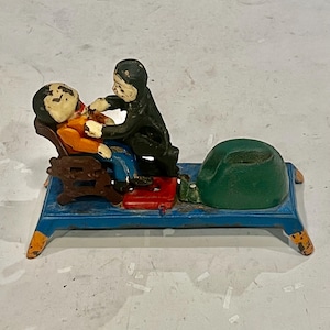 Dentist Pulling Tooth cast iron mechanical bank