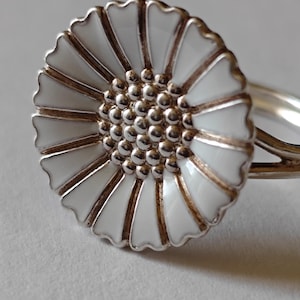Bernhard Hertz daisy silver ring with white enamel.