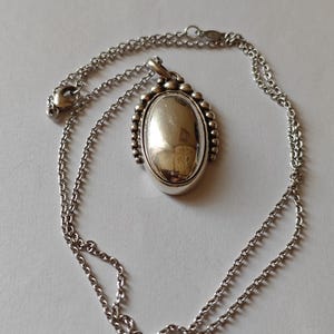 George Jensen sterling silver pendant with original chain.