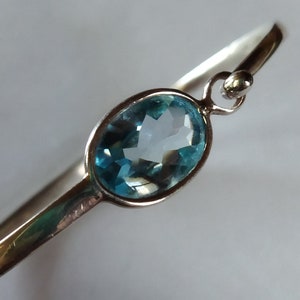 George Jensen Denmark sterling silver bangle bracelet with blue topaz.