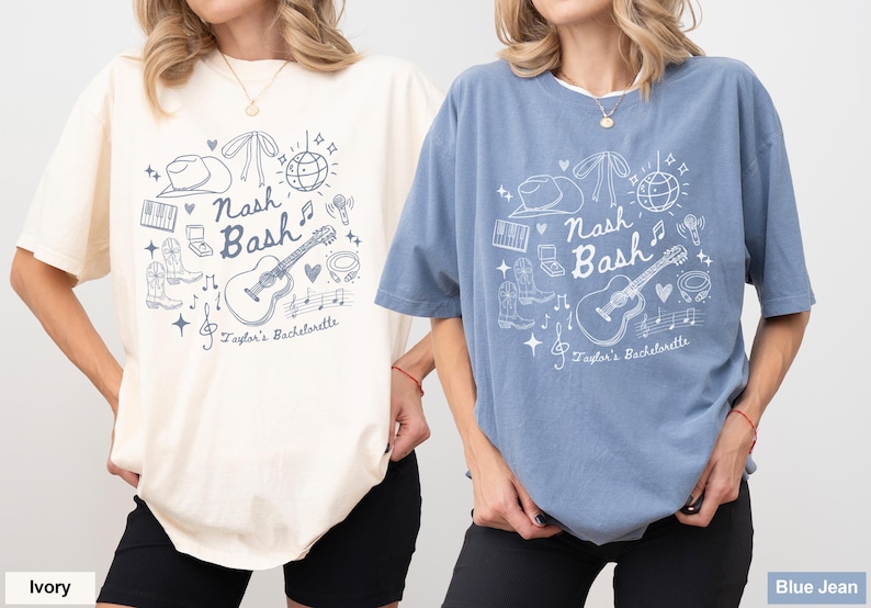 May include: Two t-shirts with a Nashville hen party theme. The shirt on the left is ivory with a white design. The shirt on the right is blue jean with a white design. Both shirts feature a guitar, a cowboy hat, a disco ball, and the text "Nash Bash Taylor's Bachelorette".