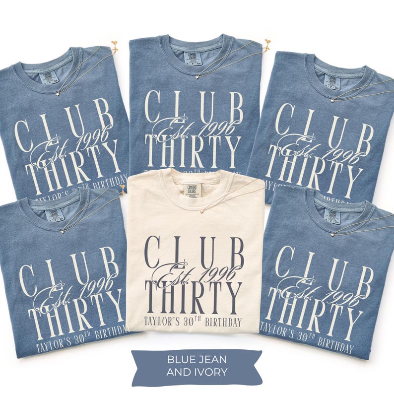 May include: Five crew neck t-shirts arranged in a group. Four shirts are blue jean colored with white text, and one center shirt is ivory with dark gray text. All shirts feature the text CLUB Est. 1996 THIRTY and TAYLOR'S 30TH BIRTHDAY.