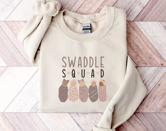 Swaddle Squad Labor and Delivery Nurse Sweatshirt, LD Nurse Gift, Gift for Doula, NICU OB Shirt, Mother Baby Nurse, Postpartum Nurse Sweater