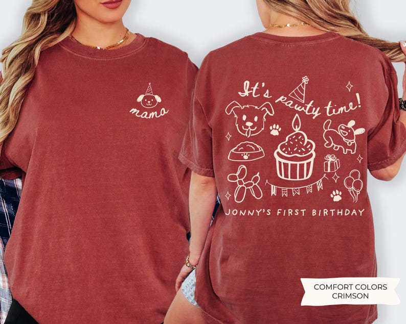 May include: Crimson-colored t-shirt with white graphic text and illustrations. The front features the word "mama" with a dog wearing a party hat. The back says "It's pawty time!" with dog-themed birthday graphics and "Jonny's First Birthday".
