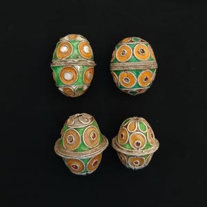 4 antique silver berber beads (tagmoutt) with enamel from southern morocco. Ancient berber jewelry