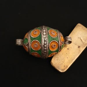 Antique silver berber pendant (tagmoutt) with enamel from southern morocco. Ancient berber jewelry