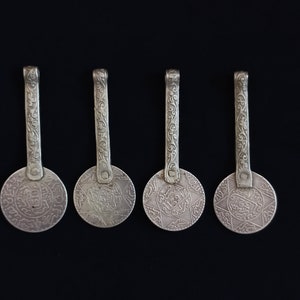 Silver coins. 4 Ancient berber pendants from southern morocco. Antique berber jewelry