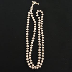 Antique silver beads
