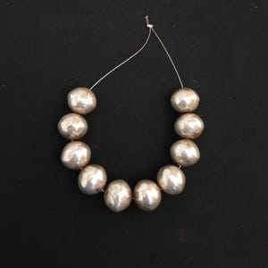 10 antique silver beads from yemen. ancient silver jewelry