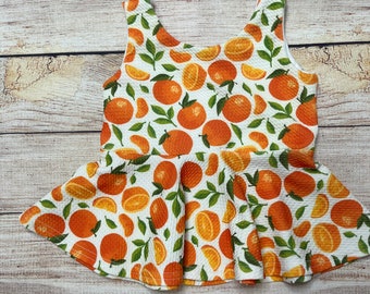 Toddler peplum orange top