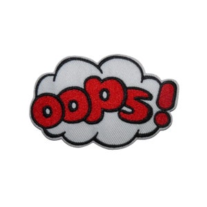 May include: Red embroidered patch with the word "oops!" in a white speech bubble.