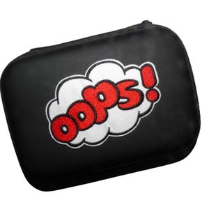 May include: Black zippered pouch with a white cloud embroidered on it. The cloud has the word "oops!" in red letters.