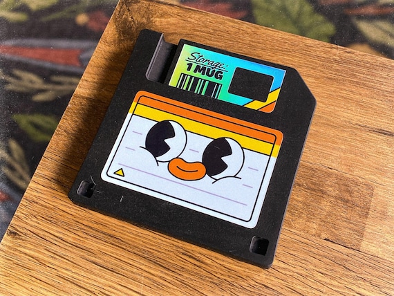 Cast in Jesmonite to nail the exact chunky plastic look of a real floppy disk — 332 hearts say programmers are quietly obsessed with these.