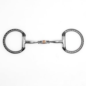 May include: A silver horse bit with a copper roller and a D-ring design. The bit has a black finish and is studded with small metal dots.