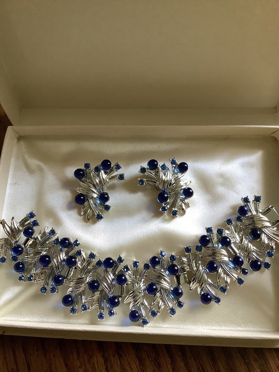 Clip earrings and bracelet with blue rhinestones