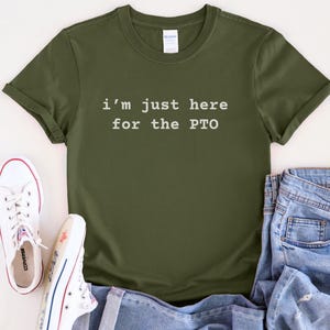 May include: A green t-shirt with the text "i'm just here for the PTO" in white.
