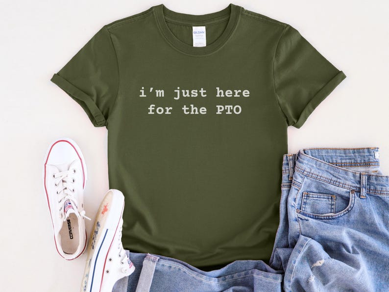 May include: A green t-shirt with the text "i'm just here for the PTO" in white.