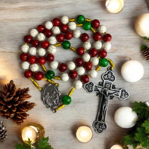 Christmas rosary | catholic | present | Jesus | holy family | catolico