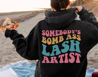 Somebody's Bomb Ass Lash Artist Sweatshirt | Lash Tech Shirt, Esthetician Hoodie, Eyelash Tech Gift, Aesthetician Sweater