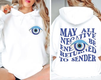 Peut inclure: Un sweat à capuche blanc avec un motif d'œil bleu sur la poitrine gauche. Le dos présente un grand motif d'œil bleu entouré du texte bleu ondulé qui indique, May all negative energy be returned to sender.