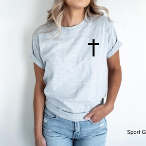 Sport grey short-sleeve t-shirt featuring a simple black cross graphic positioned on the upper left chest area
