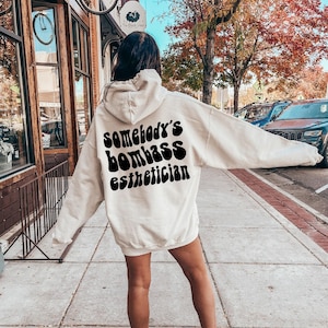Somebody's Bombass Esthetician Sweatshirt | Cute Skinfluencer Shirt, Gift For Lash Tech, Cosmetologist Gifts, New Esthetician Gift, Ass Bomb