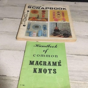 May include: A green handbook titled "Handbook of common Macrame Knots" with the text "S-100" on the bottom left corner. The book is a guide to macrame knots.