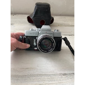 Minolta vintage 1969-1979 SRT 101 35MM SLR film camera with leather case