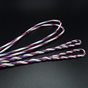 May include: Three strands of white, red and blue braided string. The string is twisted and has a decorative look.