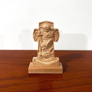 Saint Michael the Archangel table stand carved from hardwood maple.