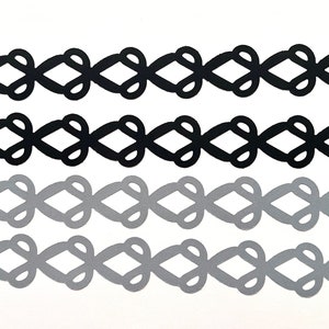 May include: Four rows of black and gray decorative paper trim with a repeating pattern of interlocking circles and diamonds.