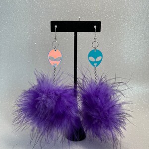 Purple fluff with alien head