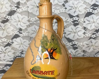 Jarra de aceite de oliva de arcilla Labbate Olio vintage con tapón de corcho original.