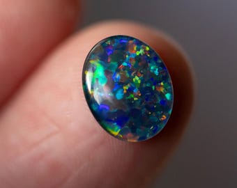 Tripletto di opale australiano da 1,6 ct, cabochon ovale, colori rosso, arancione, blu, verde, giallo, molto scintillante