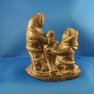 Vintage hand Carved Stone Sculpture Inuits with Seal Beatifyl Detailed
